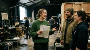 Saoirse Ronan net worth candid rehearsal photo on movie set